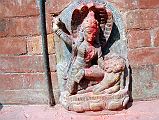 58 Kathmandu Gokarna Mahadev Temple Female Statue With Knee In Stomach Of Man 